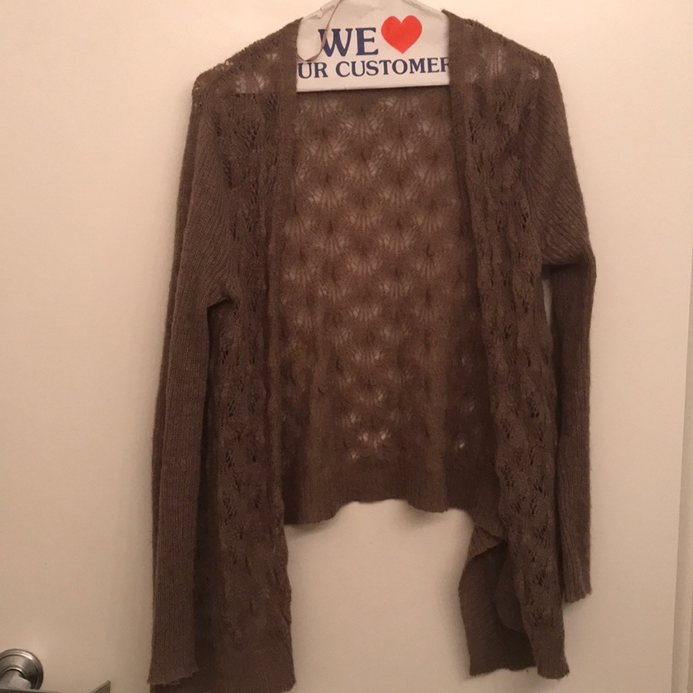 Super cute tan cardigan!